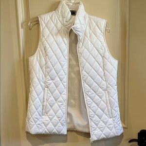 Women’s cream colored puffy vest. 
Brand new condition - NEVER worn
Size small